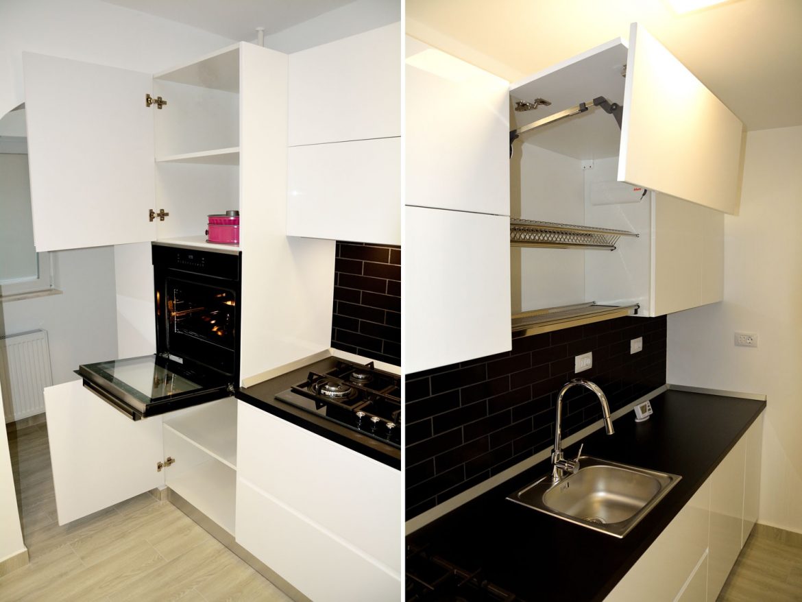 Bucatarie la comanda cu sisteme Aventos Blum electrocasnice incorporabile scurgator vase inox balamale silentioase Blum usi MDF cu frezare manere blat termorezistent negru si laterale din MDF vopsit